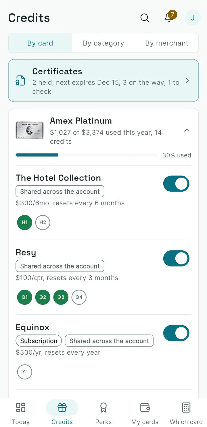 Per-card credit scoreboard with monthly and quarterly toggles
